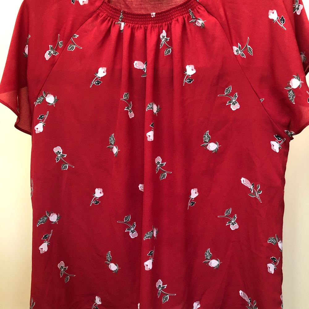 Beautiful red blouse with flowers